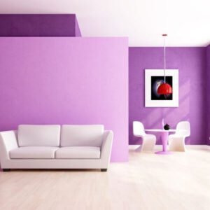 Living room with purple walls and a white sofa