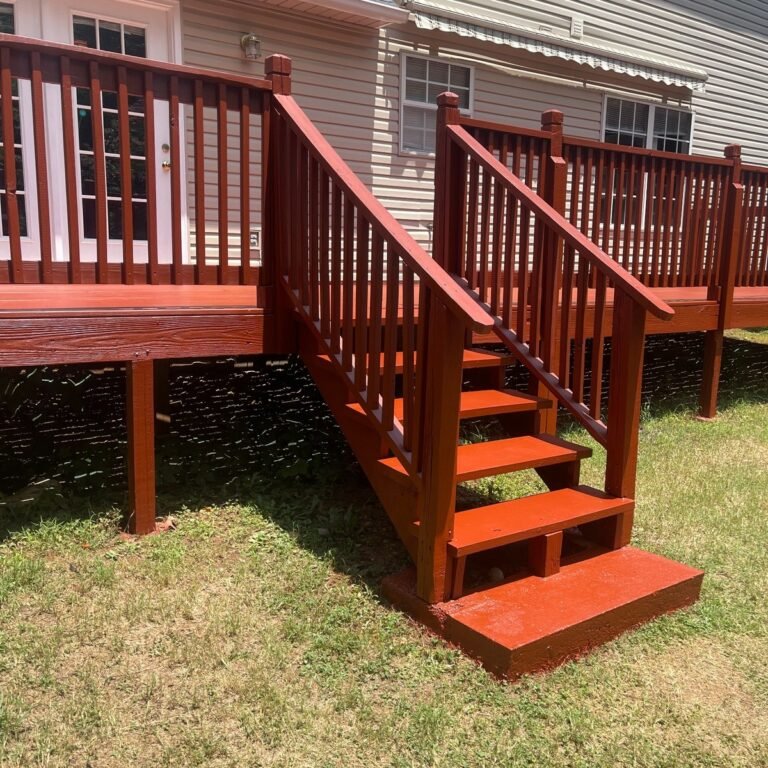 Side view of red stained deck and steps